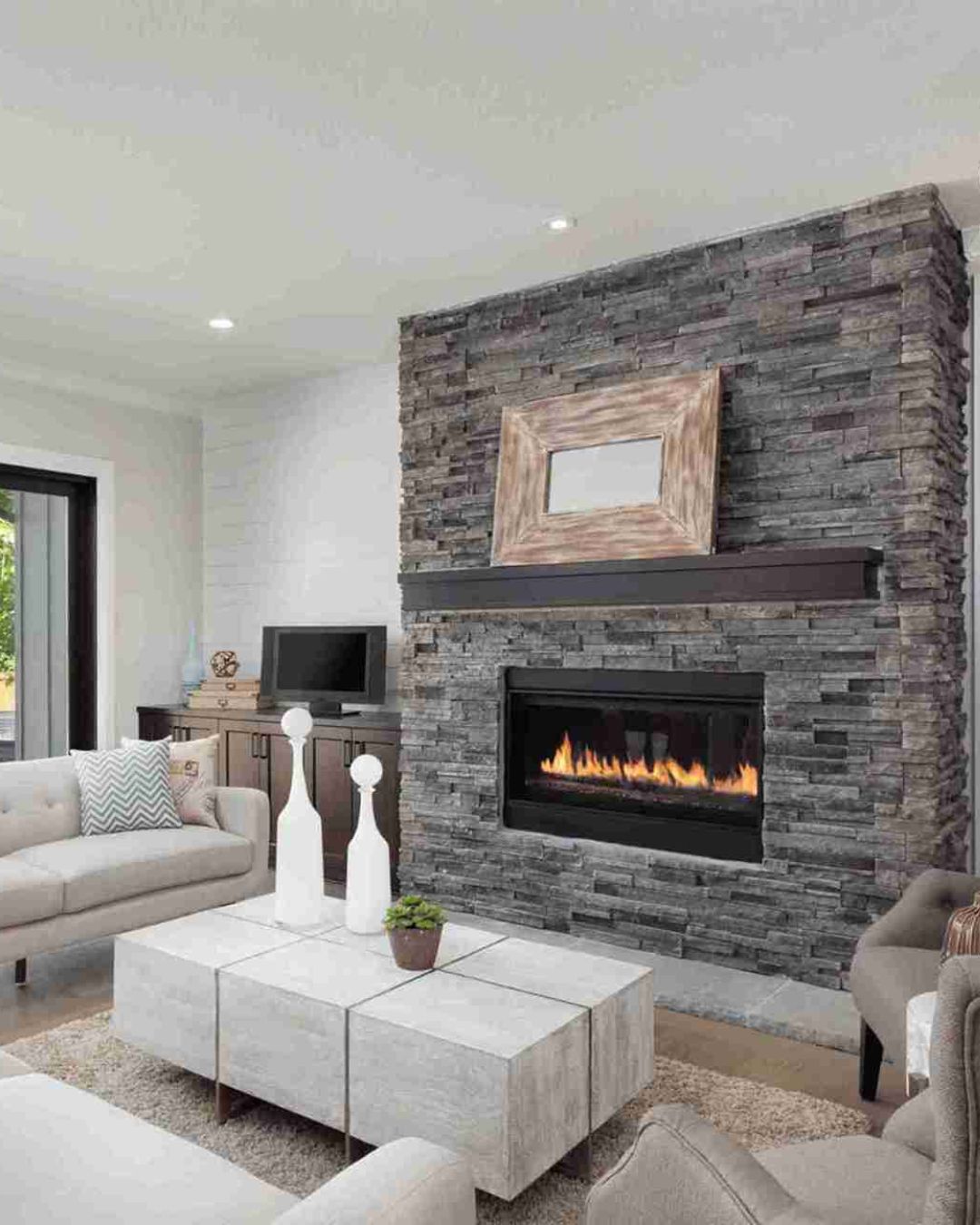 interior - fireplaces - tv - lcd - sofas - cusions - wall - mirror - table - fire - woods - igs construction