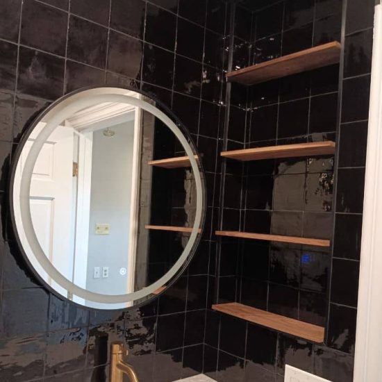 Fire Rebuild - bathroom - tub - bath tub - sink - table - taps - shower - wall - glass - toilet - tissue paper - window - mirror - frame - bottles - shampoos - igs construction